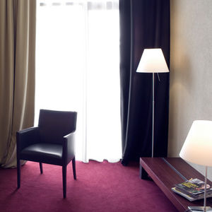 contemporary armchair / wooden / leather / bridge