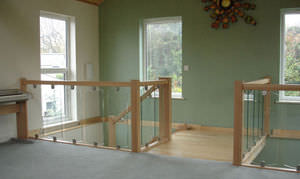 indoor railing / wooden / glass / with bars