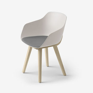 contemporary chair / upholstered / solid wood / bioplastic