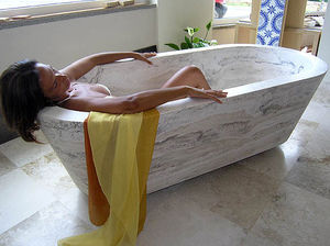 free-standing bathtub / oval / travertine