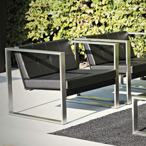 contemporary lounge chair / Batyline® / stainless steel / sled base