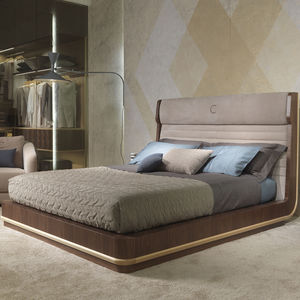 double bed / contemporary / with upholstered headboard / wooden