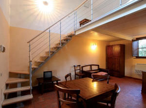 quarter-turn staircase / metal frame / wooden steps / central stringer