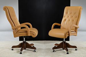 traditional executive chair / leather / swivel / on casters