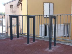 floor-mounted bike stand / steel / for public spaces