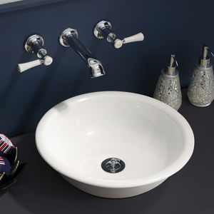 countertop washbasin / round / resin / limestone