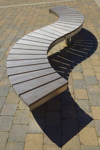 public bench / contemporary / wooden / stainless steel