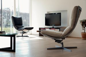 contemporary fireside chair / leather / indoor / star base