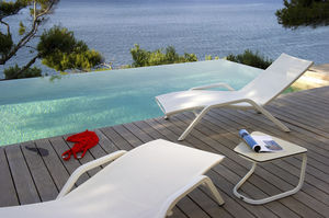 contemporary sun lounger / Batyline® / aluminum / garden