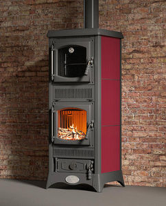 wood heating stove / traditional / cast iron / ceramic