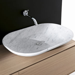 countertop washbasin / natural stone / contemporary / with shelves