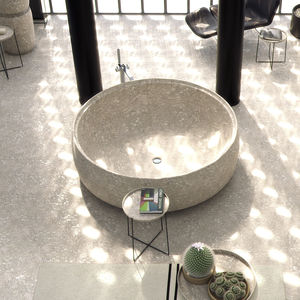 free-standing bathtub / round / natural stone