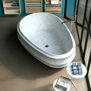 free-standing bathtub / oval / stone