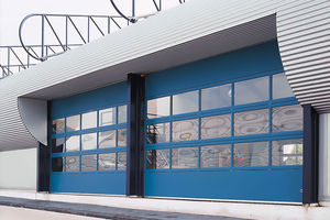 sectional industrial door / metal / automatic / for public buildings