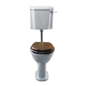 free-standing toilet / porcelain / with high tank