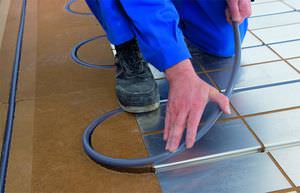 hot water underfloor heating / residential / with recycled wood panel