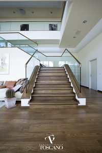 quarter-turn staircase / wooden steps / lateral stringer / with risers