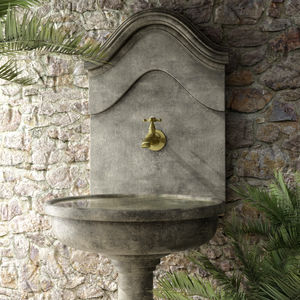 outdoor drinking fountain / stone