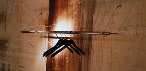 wall-mounted coat hanger rack