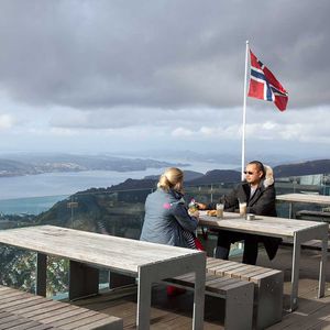 contemporary table / wooden / COR-TEN® steel / galvanized steel