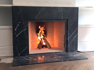 contemporary fireplace surround / marble