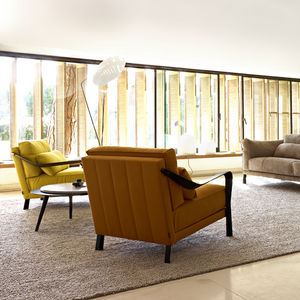 contemporary armchair / fabric / cast aluminum / by Pascal Mourgue