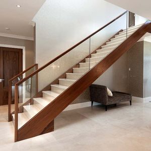 straight staircase / glass railing / wooden frame / stone steps