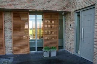 Sliding shutters / wooden / door / insulated - WRC - Norman Europe Sliding shutters / wooden / door / insulated - WRC - Norman Europe