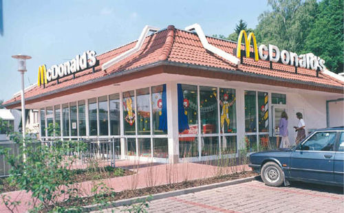 contemporary modular prefab building for retail mc donald's ALHO Systembau GmbH