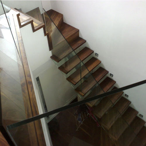 quarter-turn staircase with a central stringer (metal frame and wood steps) FULHAM, LONDON Flight Design