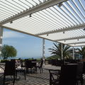 Aluminium pergola / with mobile slats / bioclimatic - THE SOLISYSTEME