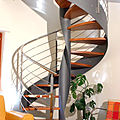circular staircase / lateral stringer / metal frame / wooden steps - PANAREA