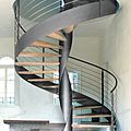 spiral staircase / lateral stringer / wooden steps / metal frame - ELICA FREE