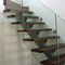 quarter-turn staircase with a central stringer (metal frame and wood steps) FULHAM, LONDON Flight Design