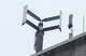 small three-bladed vertical axis wind turbine (Darrieus rotor)