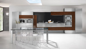 cozinha contemporânea / em inox / em madeira / sem puxadores