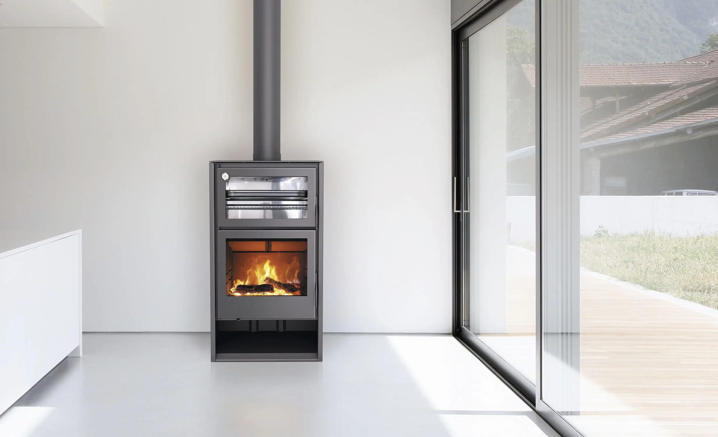 Wood heating stove - ATLAS - Carbel - corner / contemporary / metal