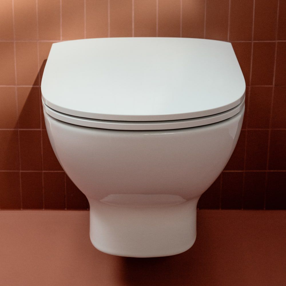 Ceramic toilet seat - H8910830 series - LAUFEN - white / beige / gray