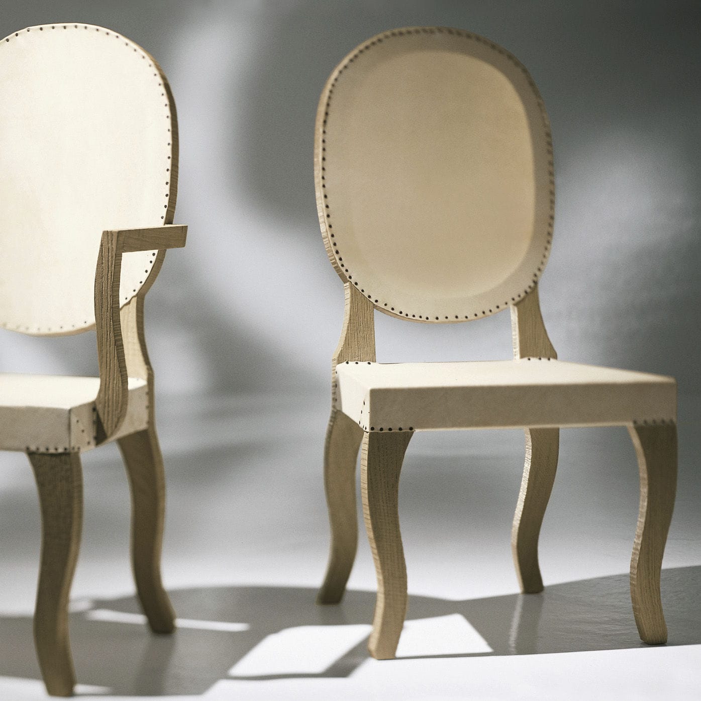 Contemporary chair GAUCHA LANDO leather / oak / solid wood base