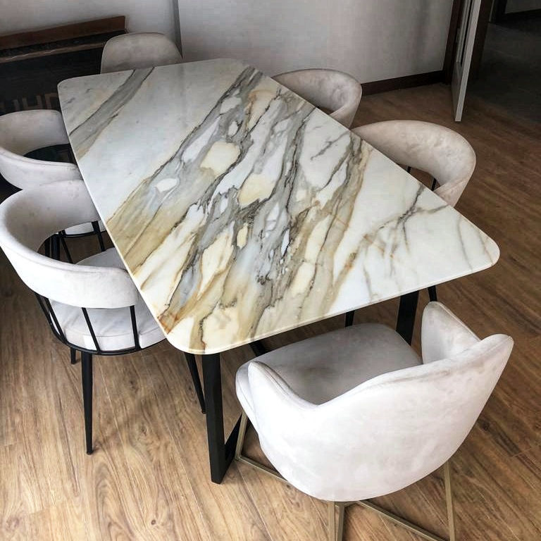 Contemporary dining table - CALACATTA - PASIFIK GRANIT - marble / metal ...