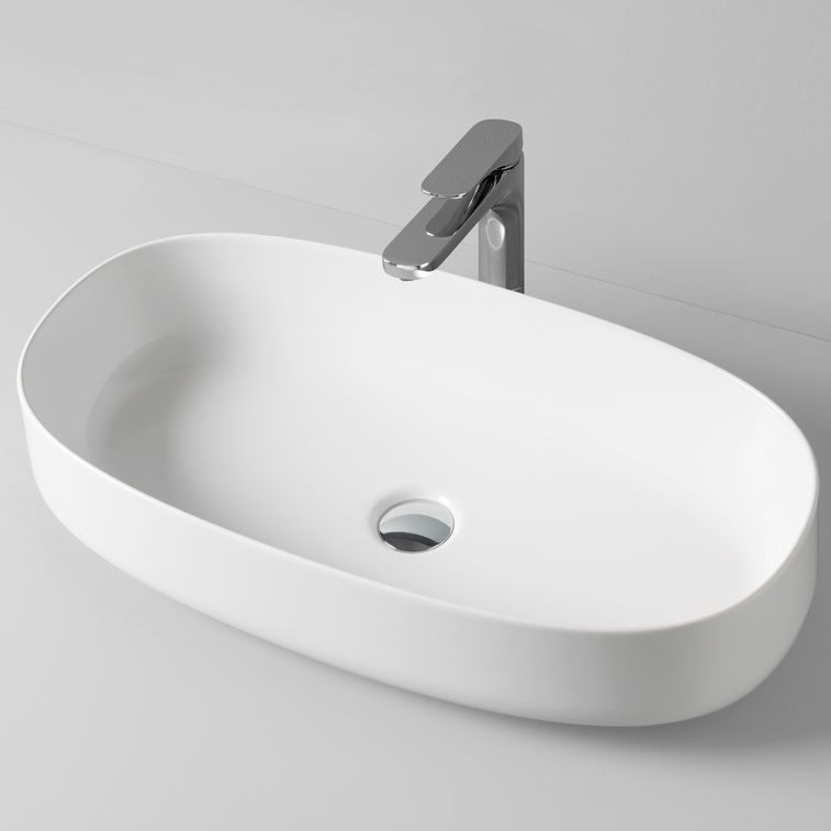 Countertop washbasin - COL005 - ART CERAM - ceramic / oval / contemporary