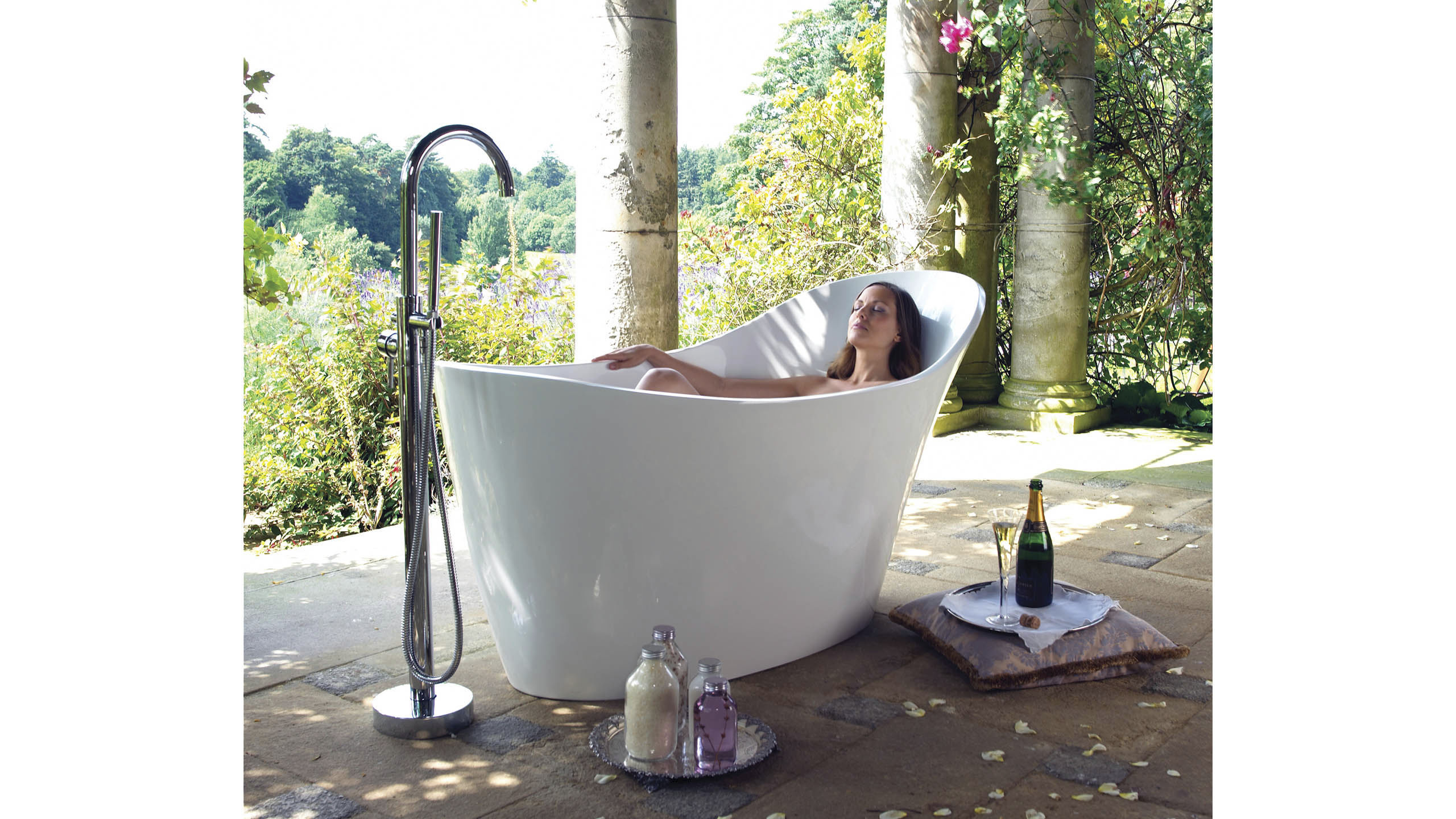 Freestanding bathtub / oval / resin / limestone AMALFI Victoria