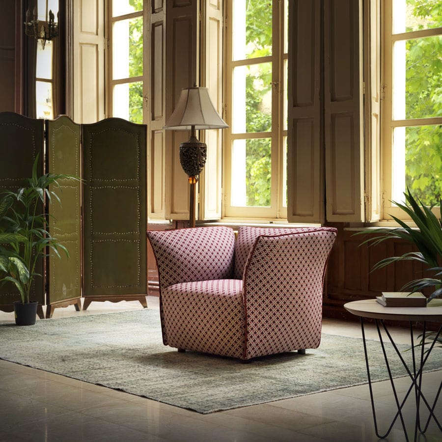 Contemporary armchair NEST KOO INTERNATIONAL leather / fabric