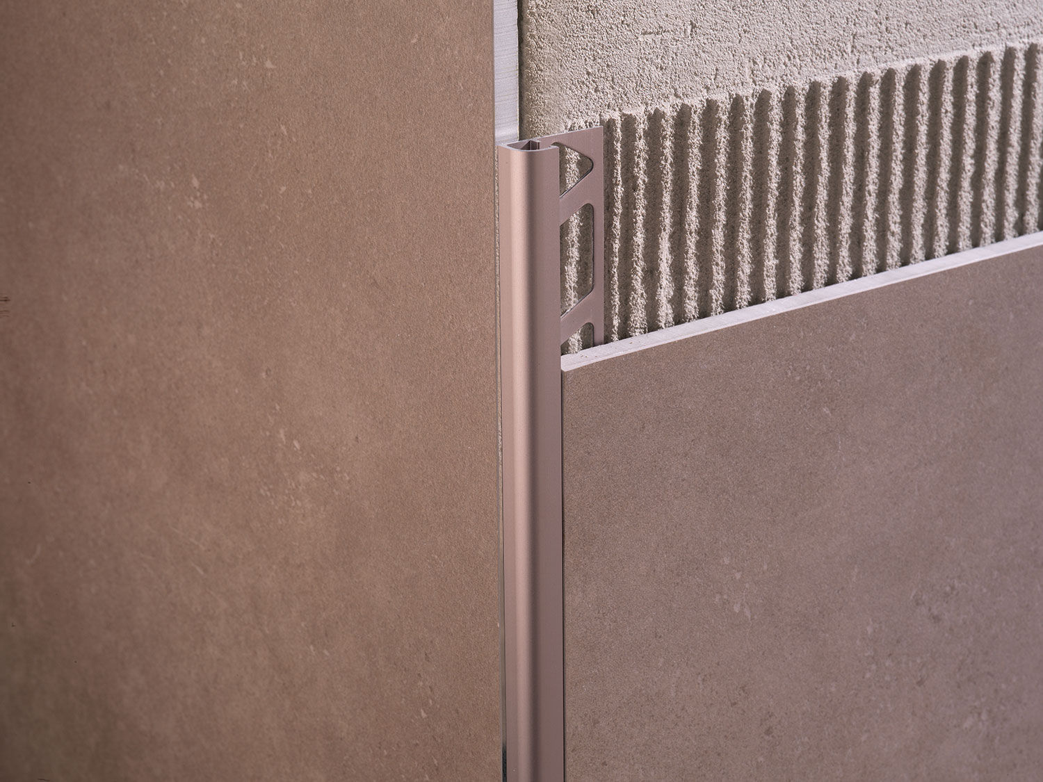 Plastic edge trim ROUNDJOLLY RJ PROFILITEC brass / aluminum