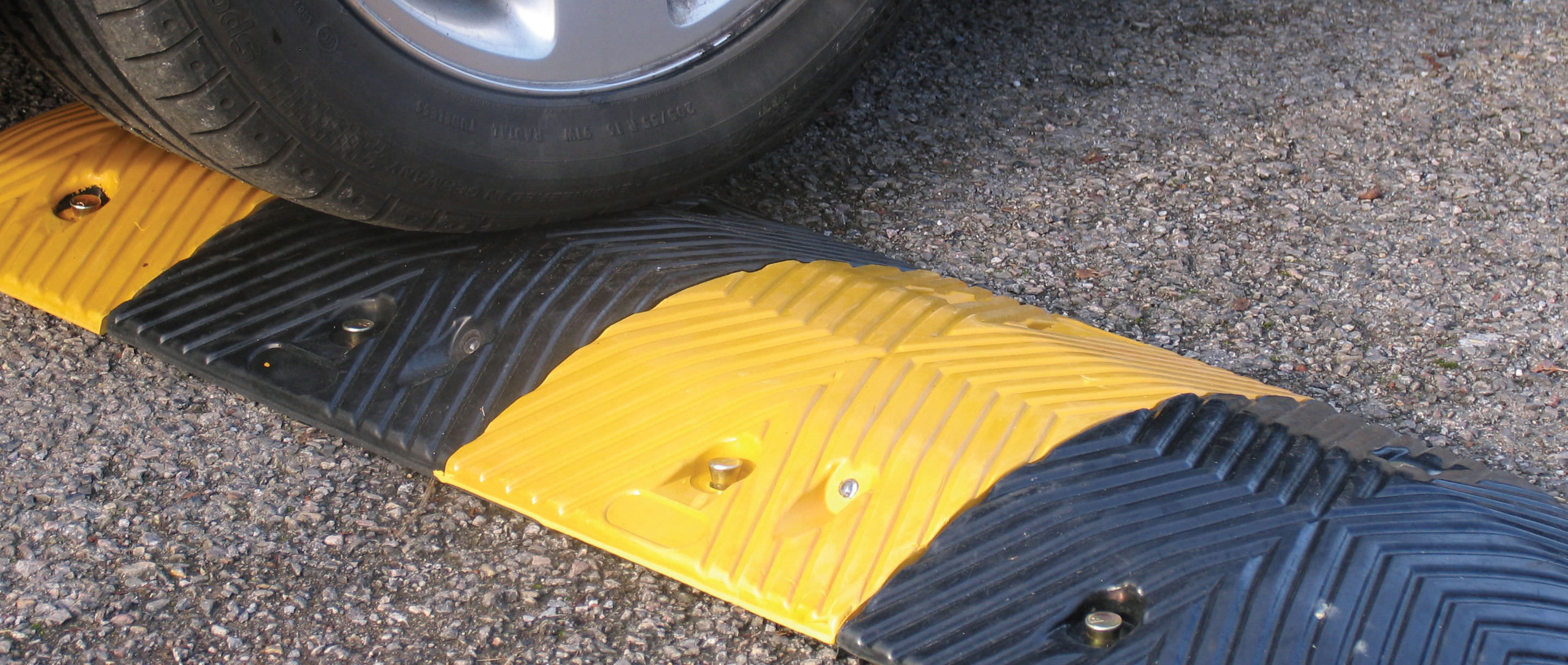 Recycled rubber wheel stop COMPACT SPEED BUMPS Watco Industrial