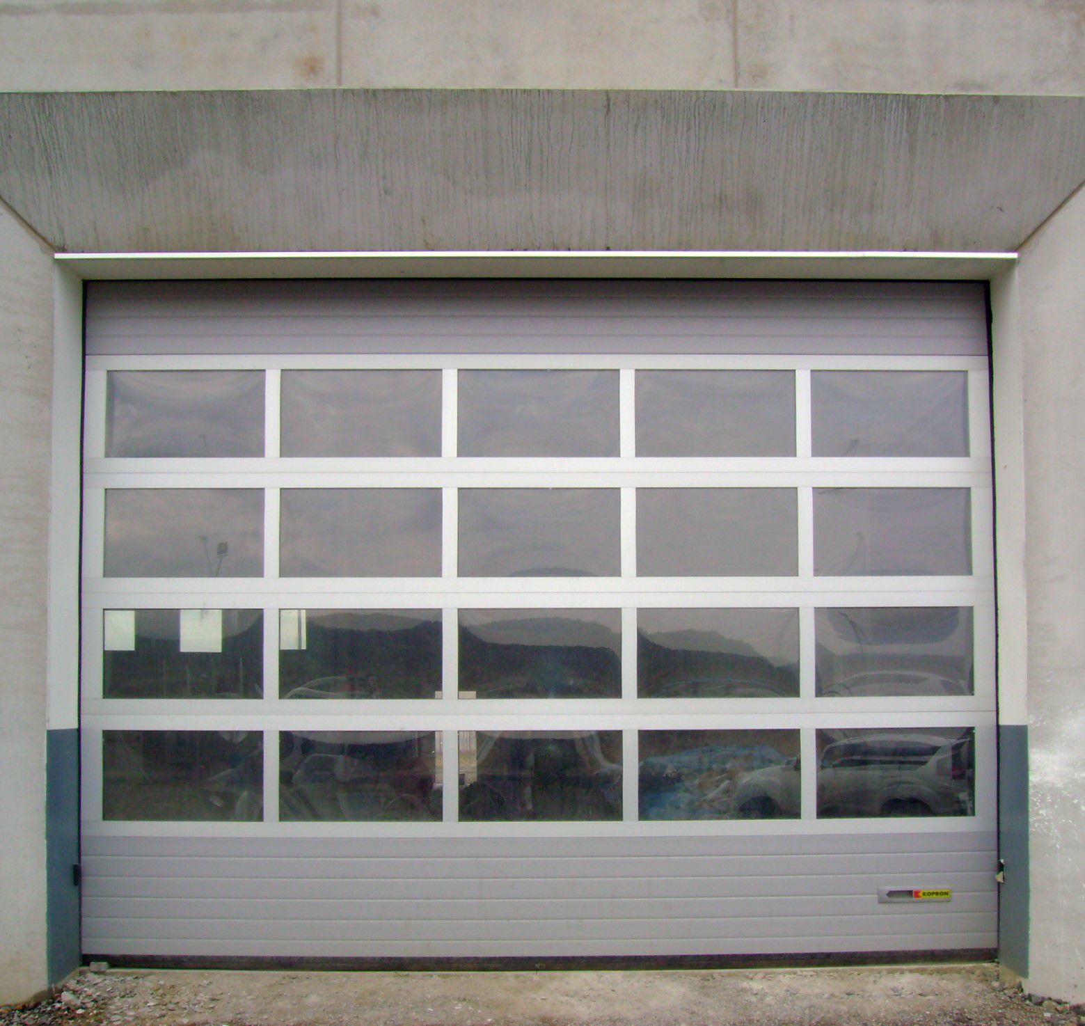 Sectional industrial door - K-VISION - KOPRON - cast aluminum ...