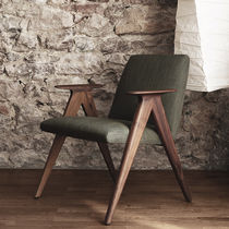 Contemporary armchair / fabric / leather...