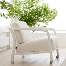Contemporary armchair / fabric / leather...