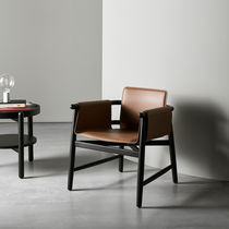 Contemporary armchair / fabric / leather...