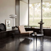 Contemporary fireside chair / fabric / leather...
